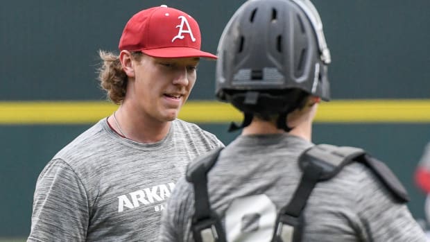 Razorbacks Hagen Smith walks off after inning of work